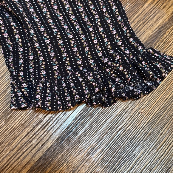 Black jumpsuit with floral accents - Picture 5 of 9